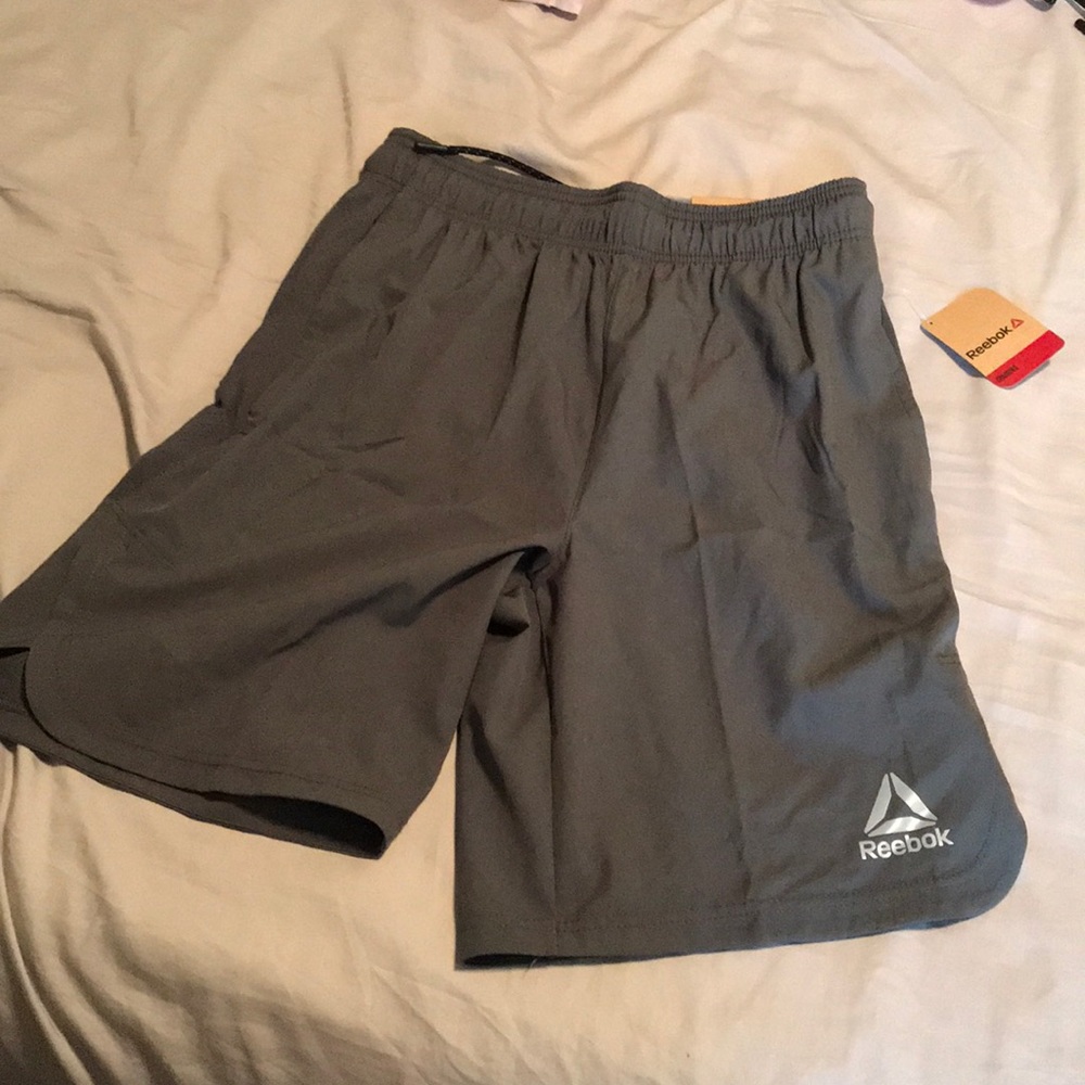 Reebok men shorts slim athletic but never worn